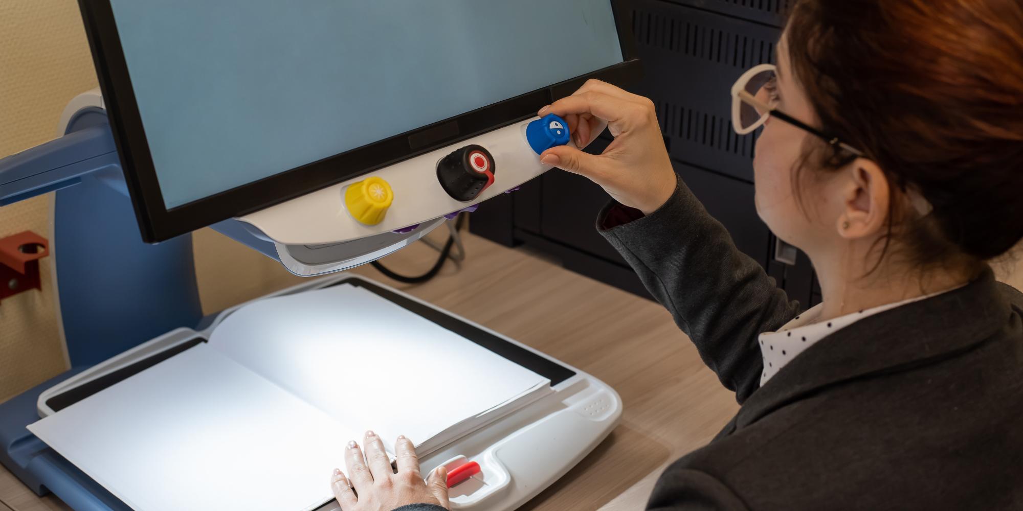 A visually impaired woman uses a screen reader